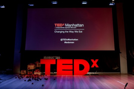 TEDxManhattan event stage with audience